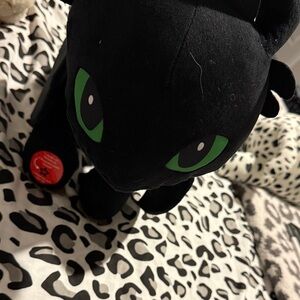 Black Plush Toy with Green Eyes